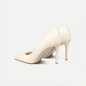Off-white patent leather pointed-toe stiletto pumps