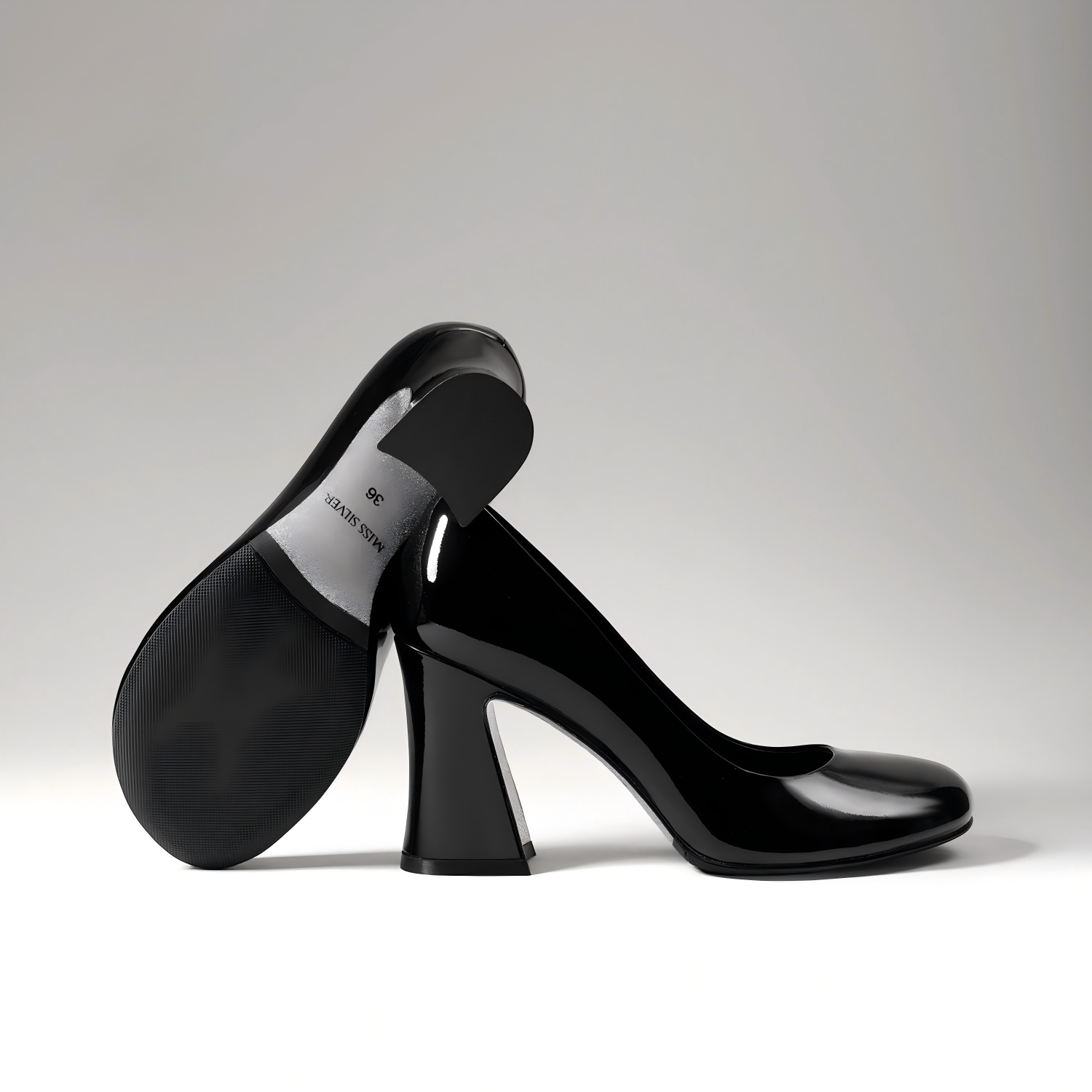 Black Patent Leather Block Heel Pumps with Polished Finish