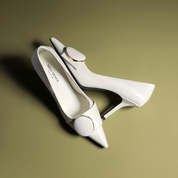 Off-White Pointed-Toe Stiletto Pumps with Buckle Detail