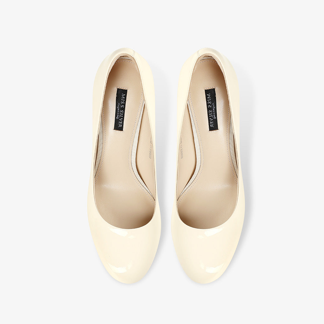 Ivory Patent Leather Stiletto Pumps