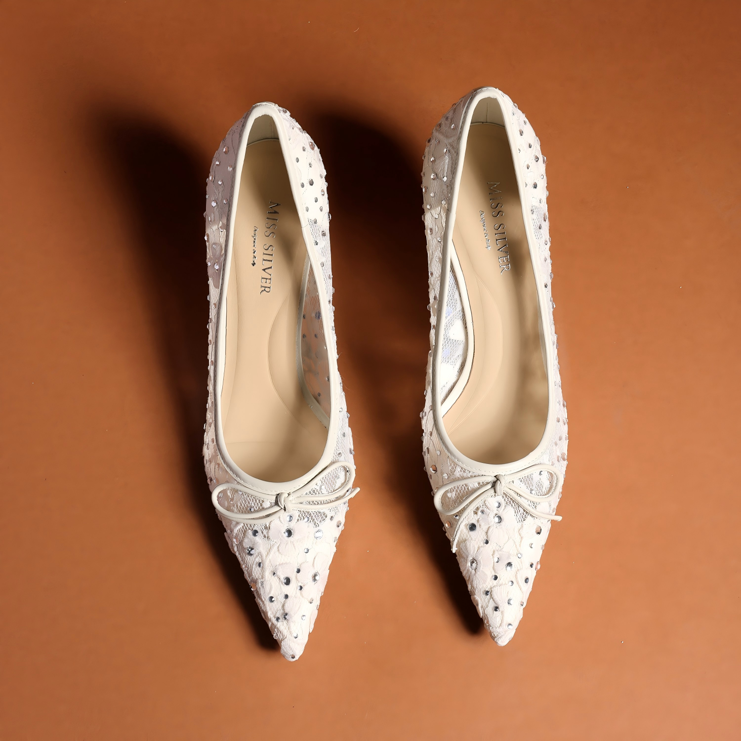 Ivory Lace Rhinestone Pointed Toe Bow Pumps