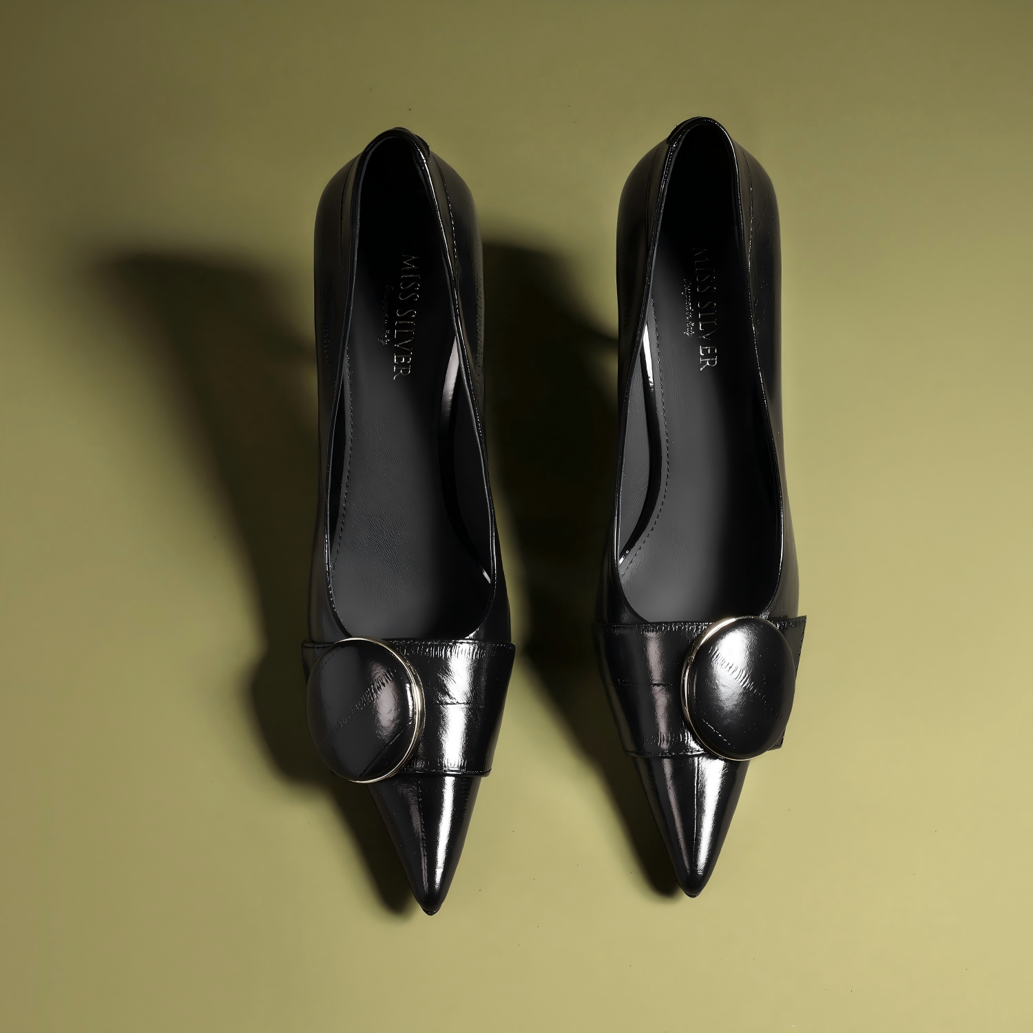Black Pointed-Toe Stiletto Pumps with Buckle Detail